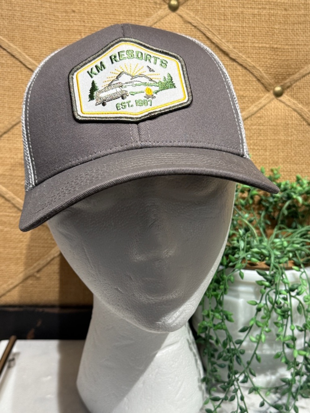 KM Resorts Gray Trucker Hat with Embroidered Patch
